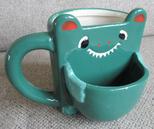 Green Dragon mug with cookie